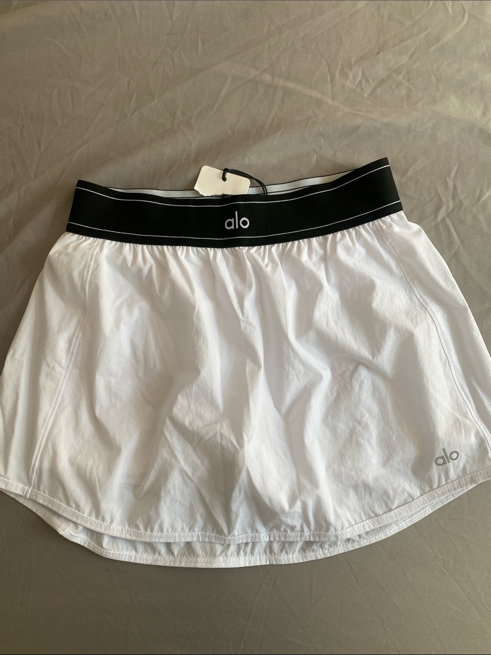 ALO Yoga match point White Athletic Skort with Black Branded Waistband